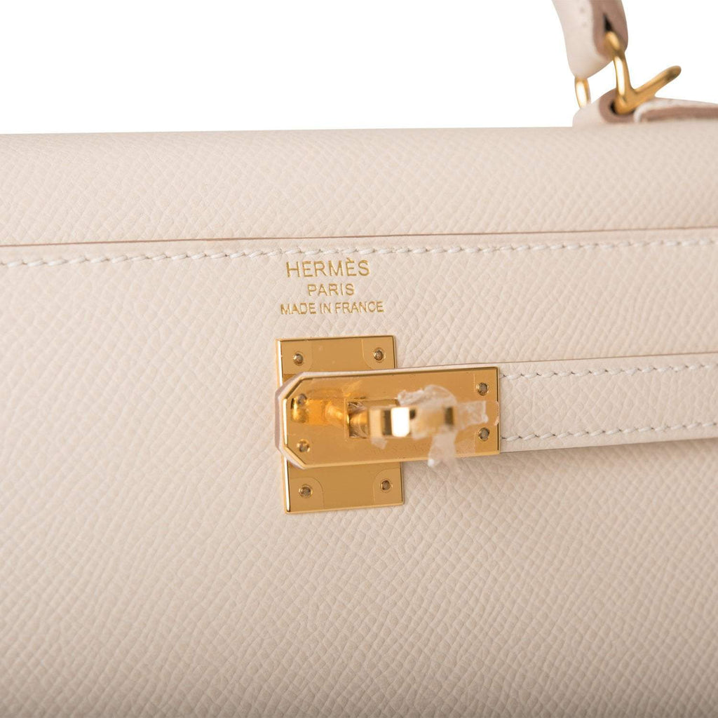 Detachable leather shoulder strap of Hermes Kelly 25 Sellier in Craie Epsom leather