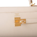 Detachable leather shoulder strap of Hermes Kelly 25 Sellier in Craie Epsom leather