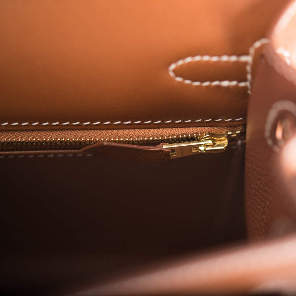 Close-up of gold hardware and lock on Hermes Kelly 25