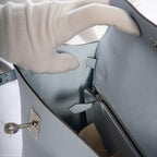 A close-up view of the palladium-tone clochette