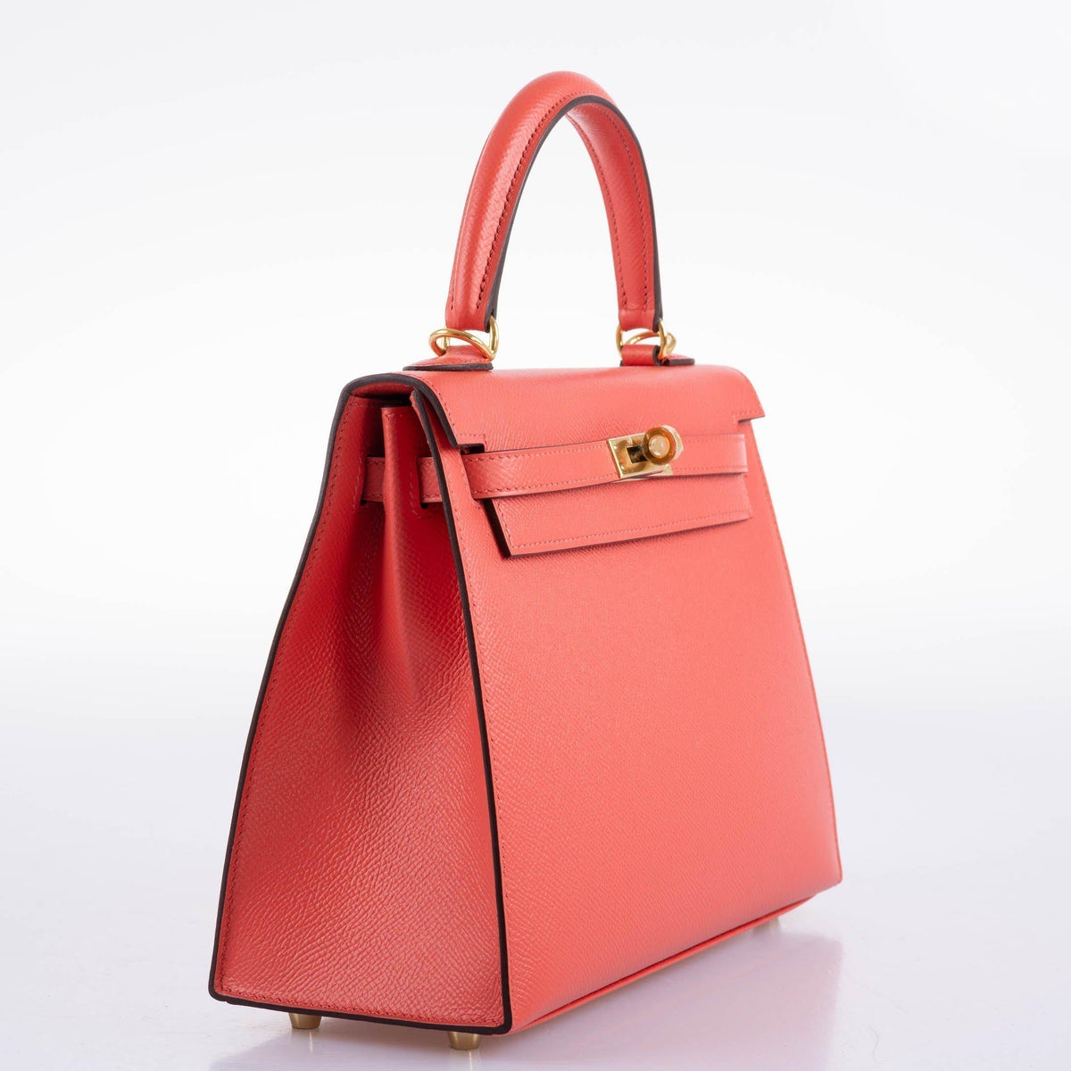 A side profile of the Hermes Kelly 25, highlighting its sharp silhouette