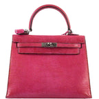Hermes Kelly 25 Sellier handbag in Fuchsia Pink lizard with palladium hardware.