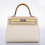 The Hermes Kelly 25 tri-color bag with its removable shoulder strap