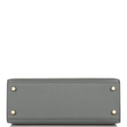 Flap opened on Vert Amande Kelly 25 showing toggle and sangles