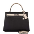 Hermes Kelly 28 Bi-Color Sellier handbag in Black and Craie Epsom leather with brushed palladium hardware.