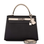 Hermes Kelly 28 Bi-Color Sellier handbag in Black and Craie Epsom leather with brushed palladium hardware.