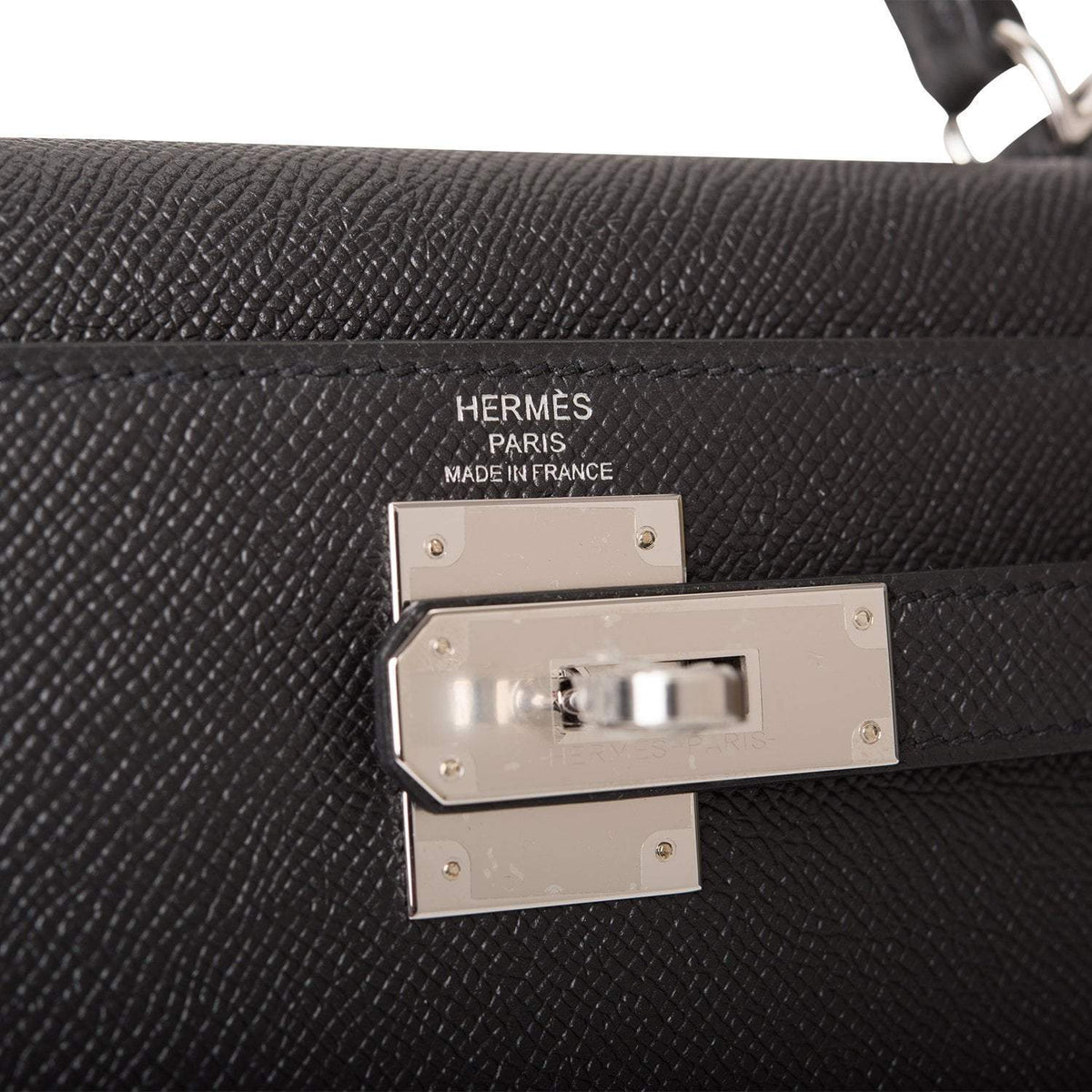 lock view of Hermès Kelly 28 Sellier in black Epsom leather