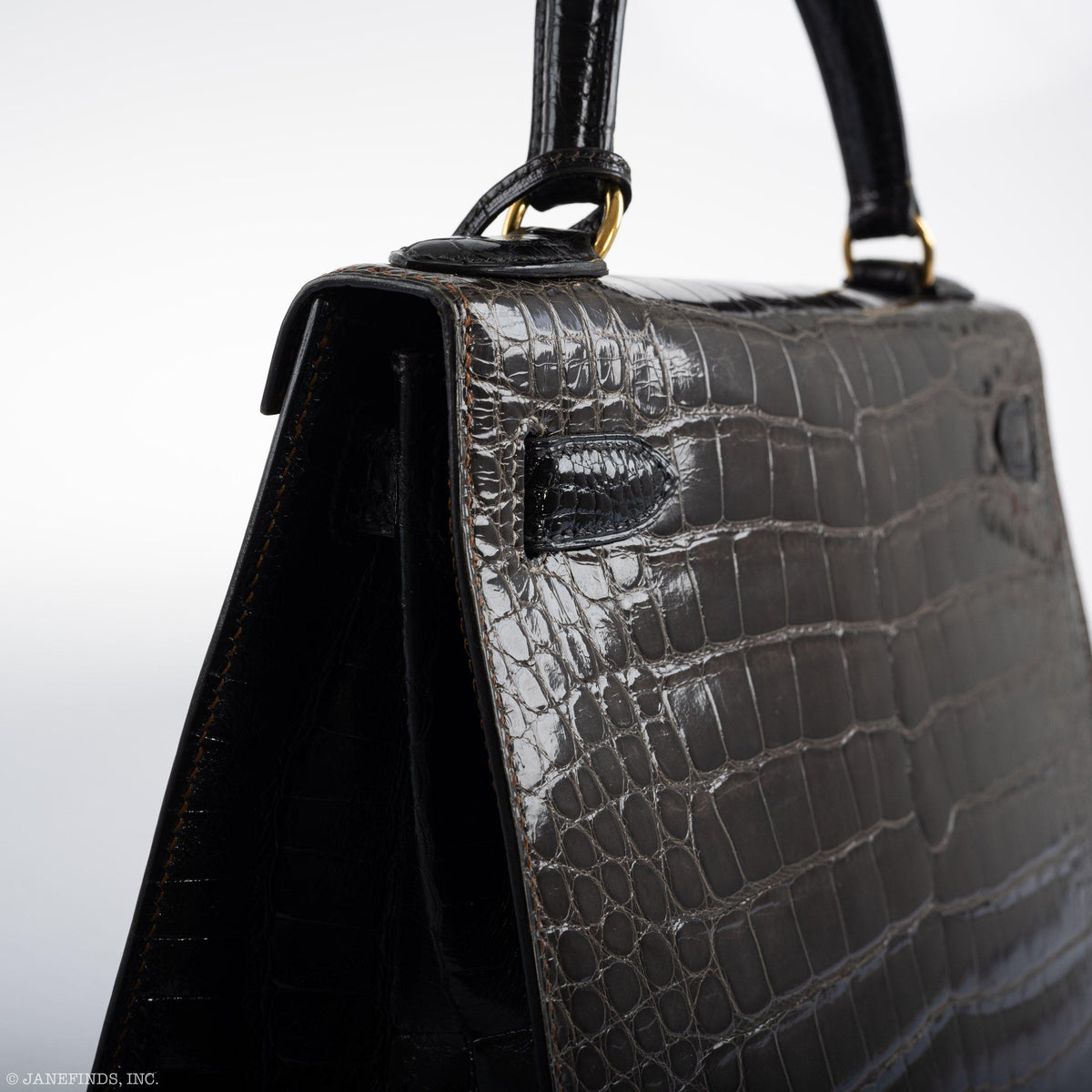 The bag with its accompanying clochette, lock, and keys