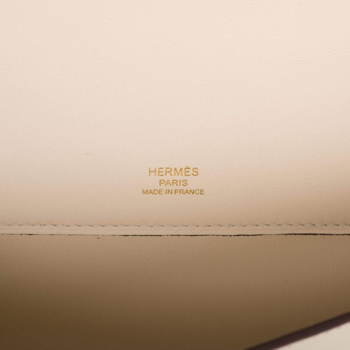 Back view of the Hermes Kelly Cut, showcasing its pristine condition