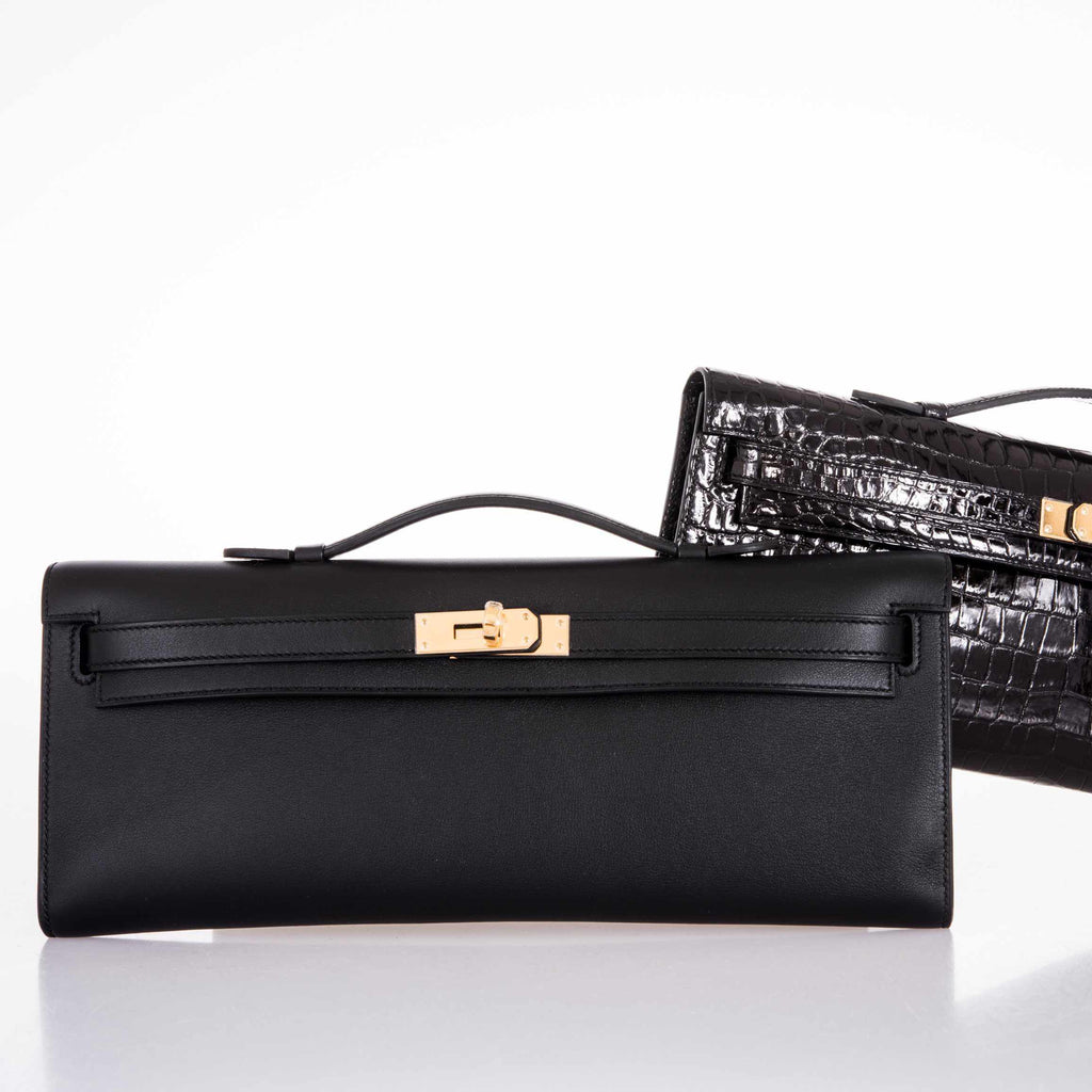 Interior view of Hermes Kelly Cut black Swift leather clutch