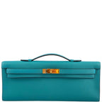 Hermes Kelly Cut clutch bag in Blue Paon Swift leather with gold hardware.