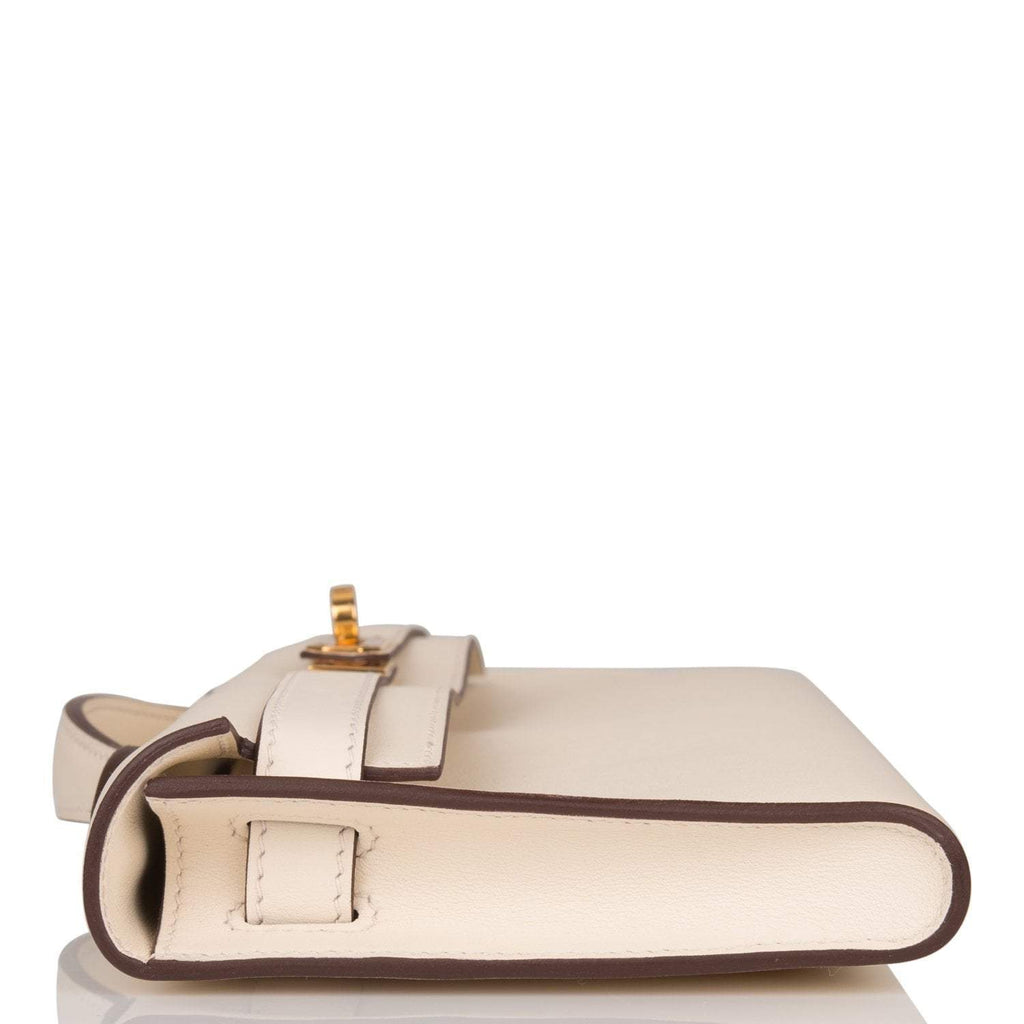Side profile of the Hermes Kelly Cut, highlighting its slim, structured shape