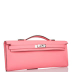 A detailed view of the palladium-tone clochette and lock