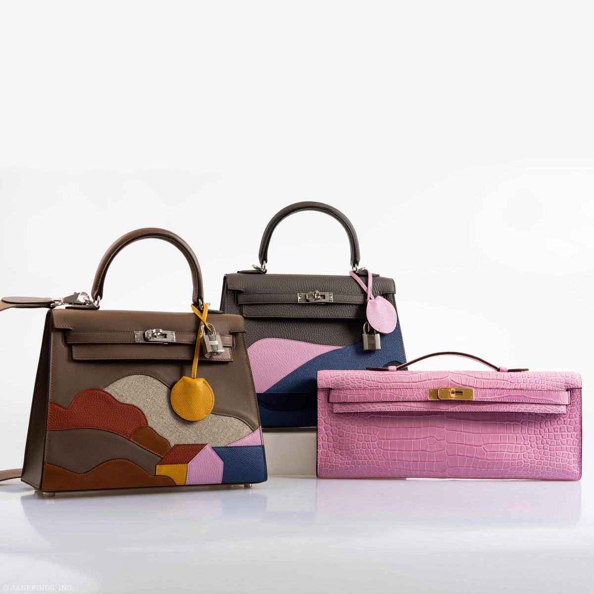 Full view of the Hermes Kelly Cut Pochette, showing its vibrant color and exotic texture