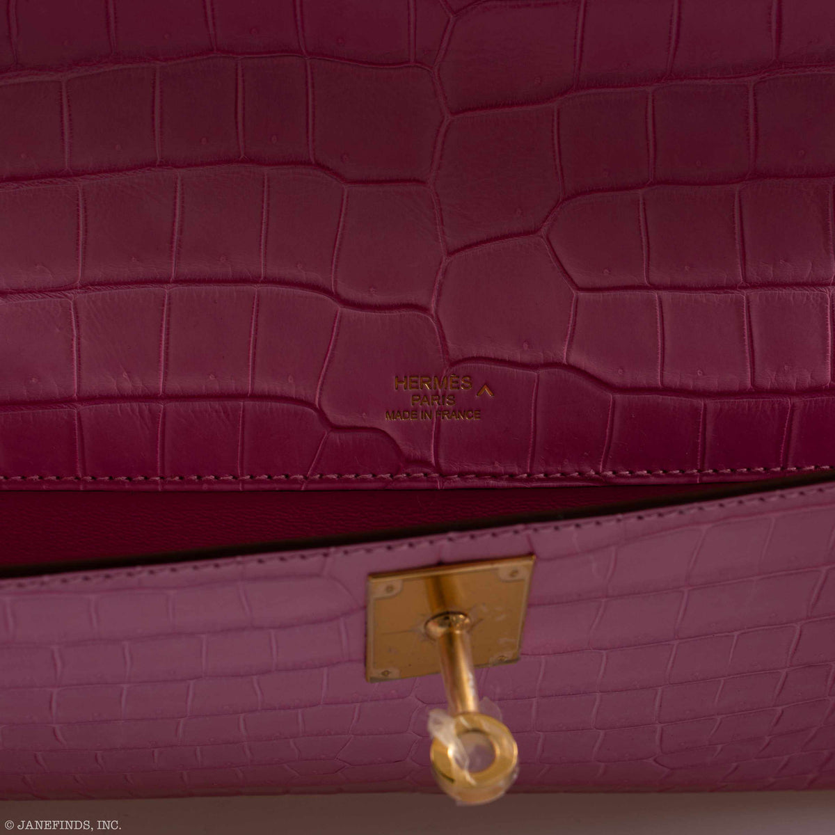 Side view of the Hermes Kelly Cut Pochette, highlighting its structured silhouette