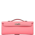 The Hermes Kelly Cut in Rose D'ete being carried on the wrist