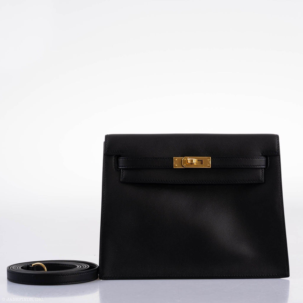 An image focused on the signature gold-tone turn-lock and closure plate