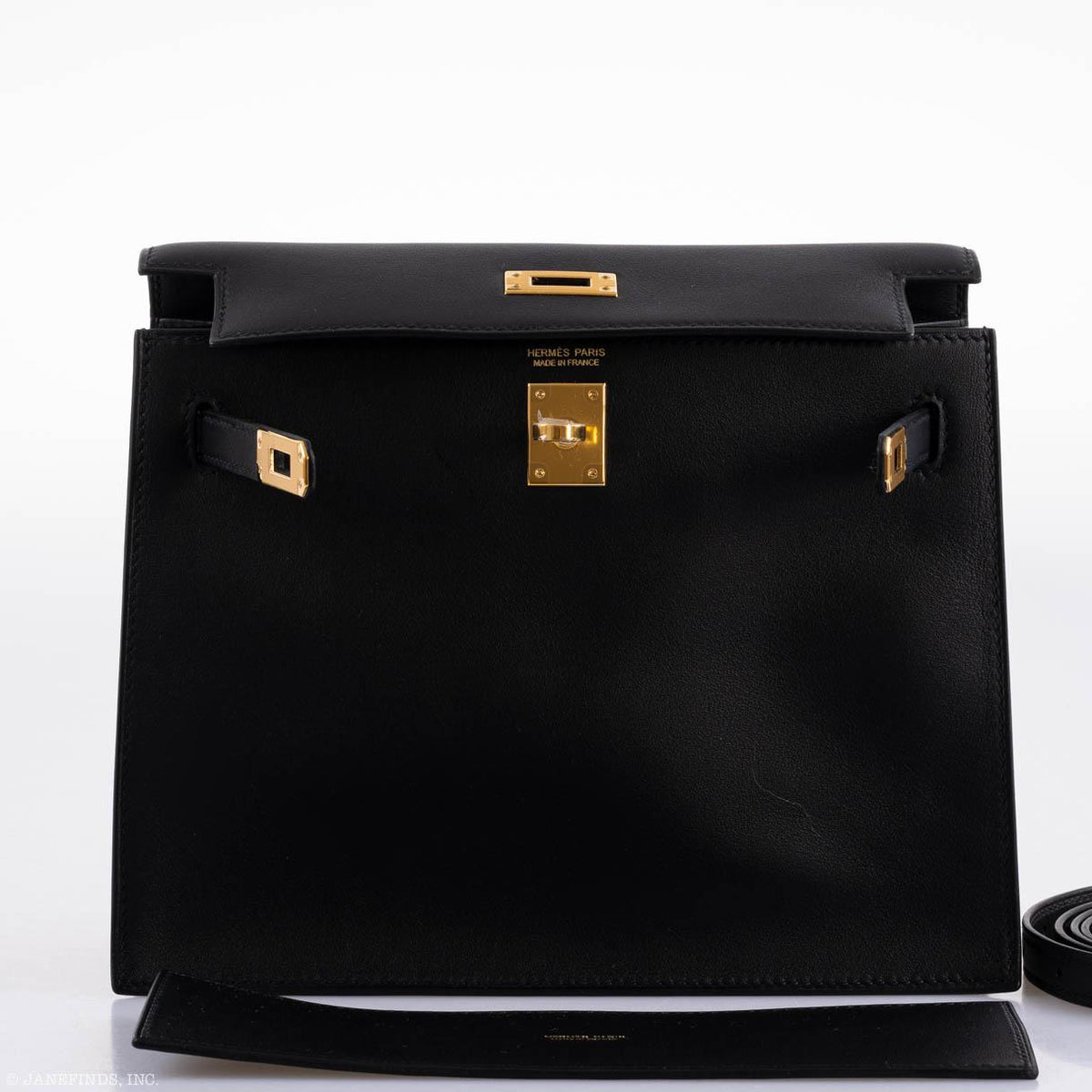 A detailed shot showing how the long strap can be adjusted for different carrying styles