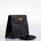 A close-up of the single rolled top handle of the Hermes Kelly Danse II
