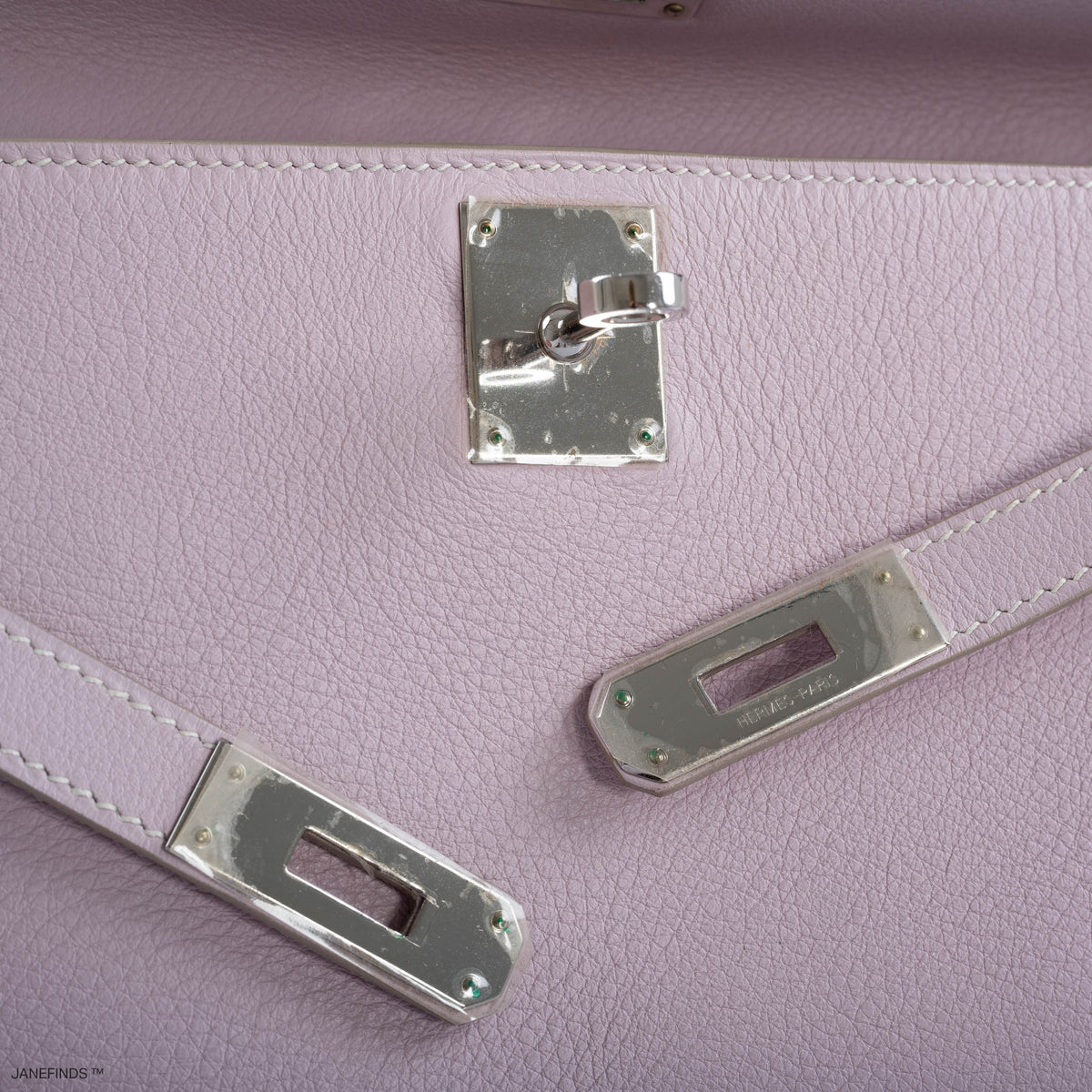 Back view of Rose Dragee Hermes Kelly Longue Evergrain leather clutch.