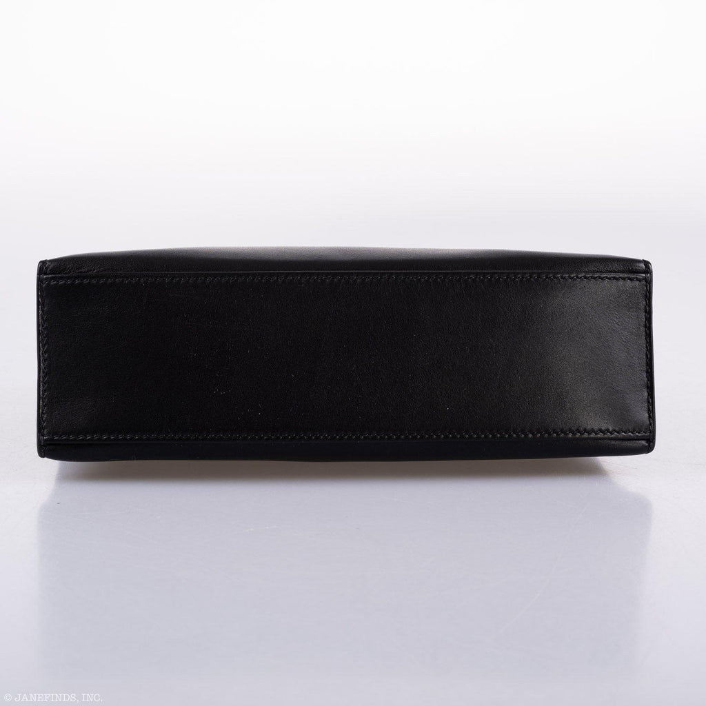 Interior view of Hermes Kelly Mini Pochette in black Swift leather.