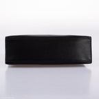 Interior view of Hermes Kelly Mini Pochette in black Swift leather.