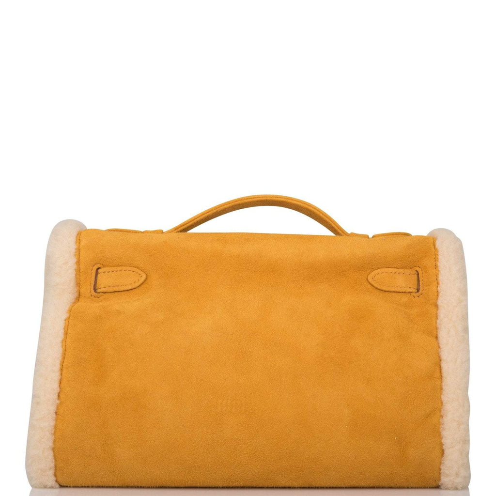 Rear view of Teddy Kelly muff bag in suede and shearling