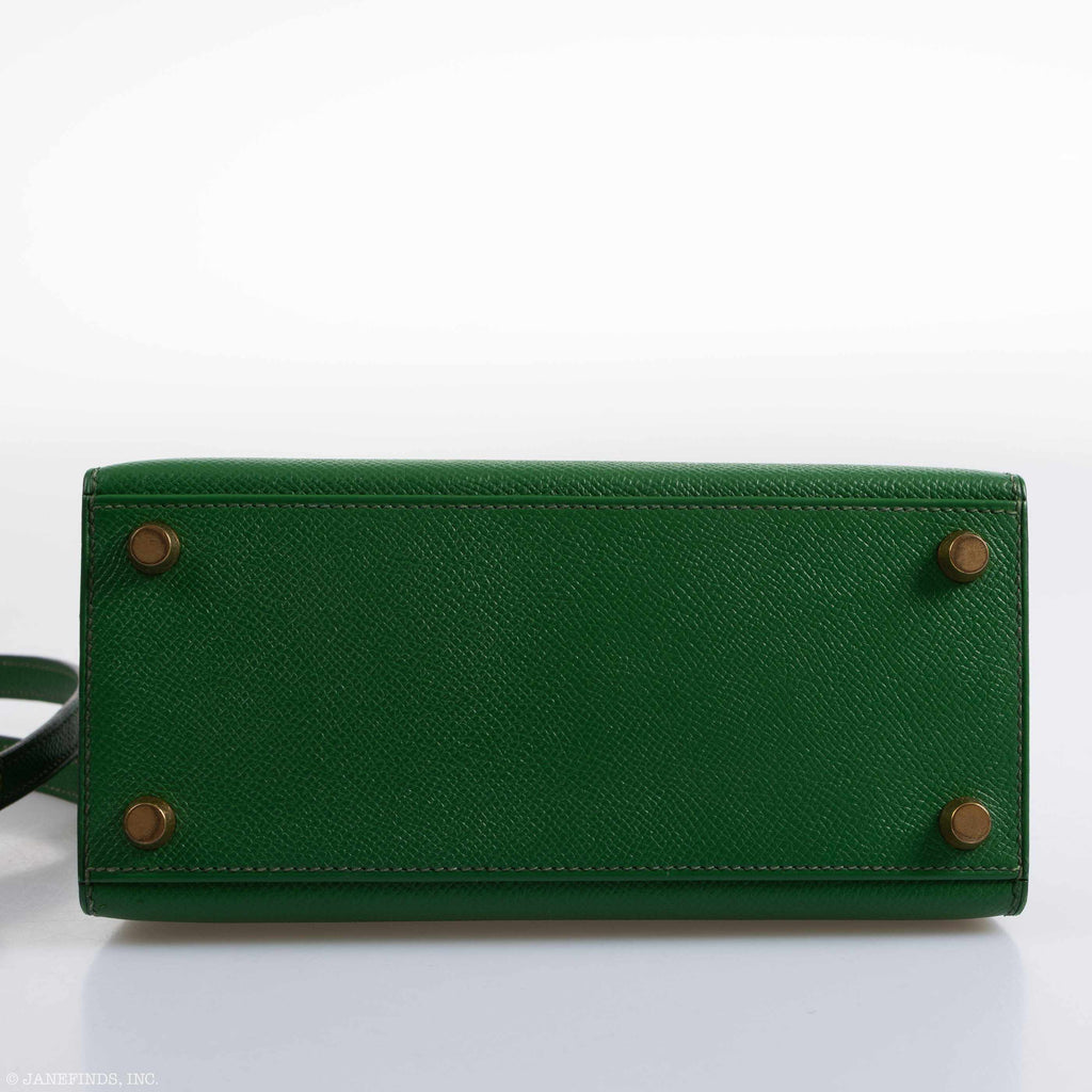 An open view of the bag's interior, showing the single slip pocket and matte leather lining