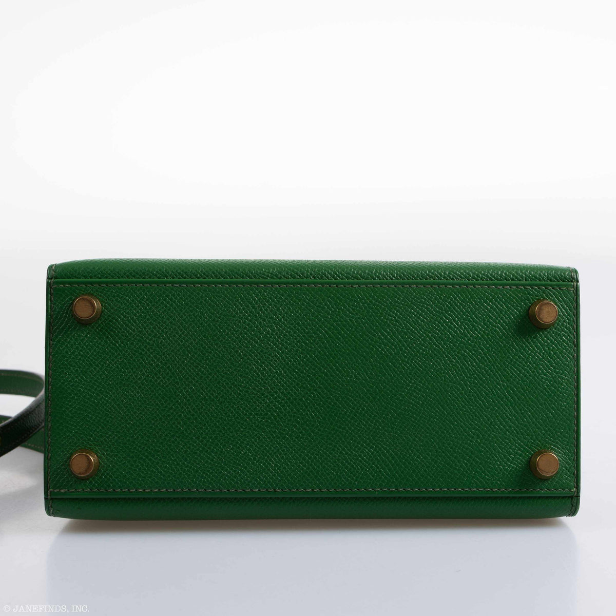 An open view of the bag's interior, showing the single slip pocket and matte leather lining