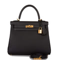 Front view of the Hermes Kelly Retourne 25 in Black Togo leather