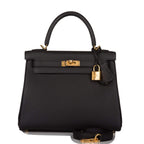 Front view of the Hermes Kelly Retourne 25 in Black Togo leather