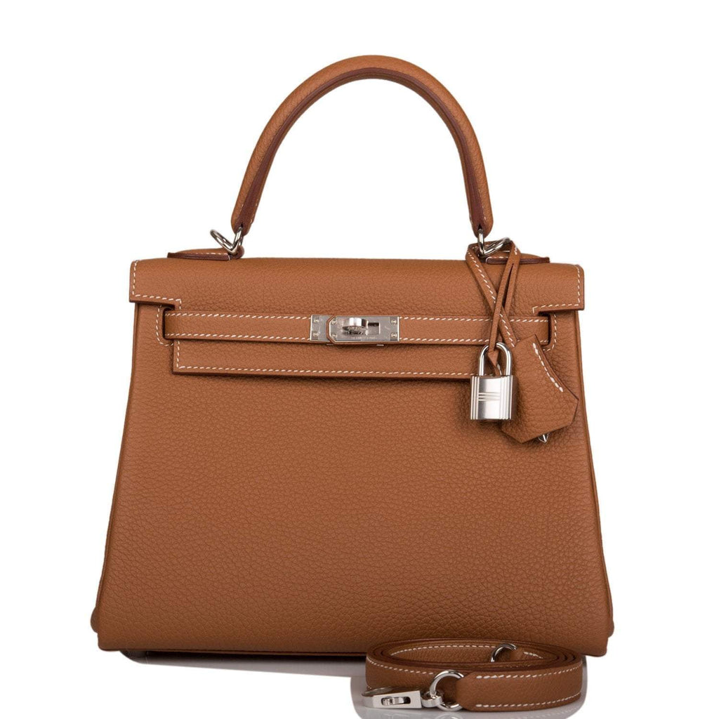 Front view of the Hermes Kelly Retourne 25 in Gold Togo leather