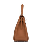 Side profile of the Hermes Kelly Retourne 25, highlighting its soft shape.

