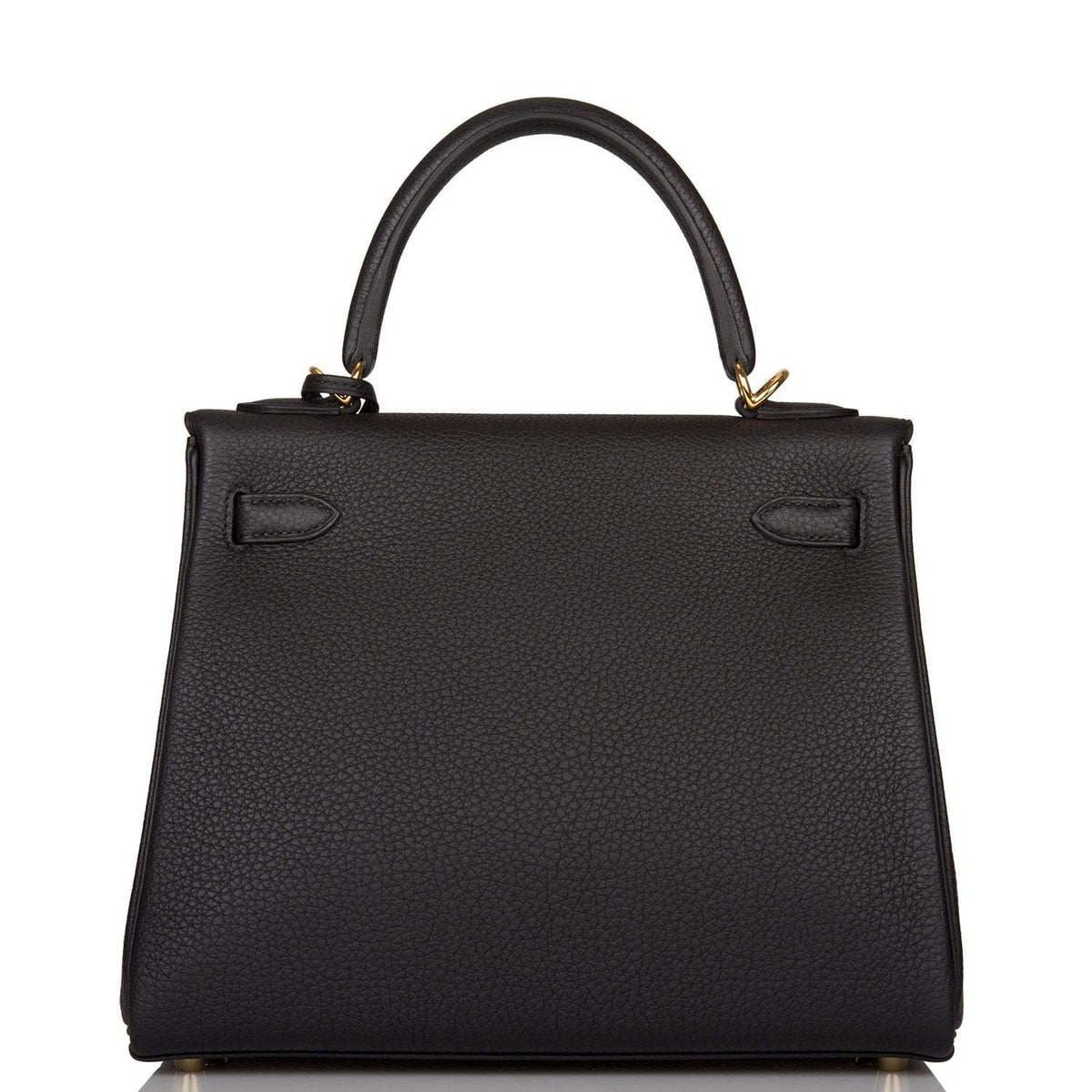 A view of the signature gold-tone turn-lock on the front flap of the bag