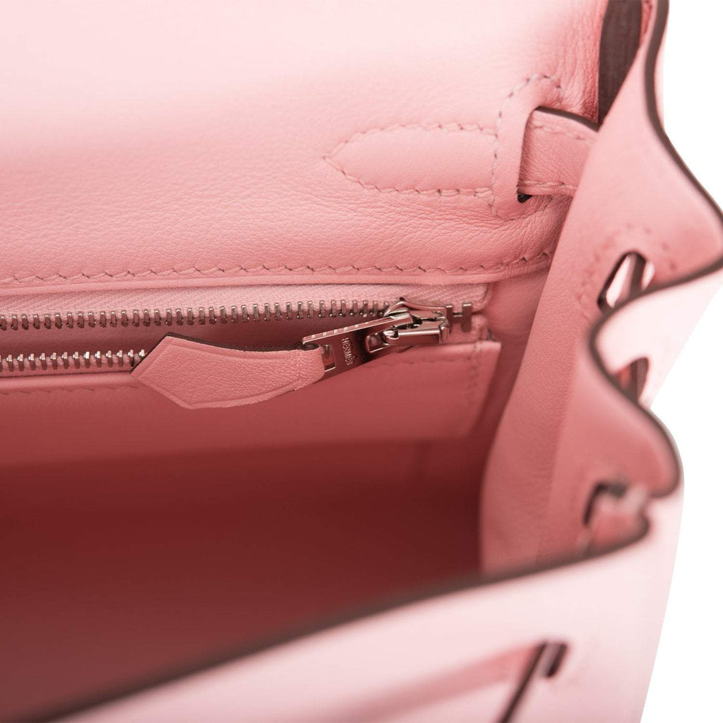 A close-up of the palladium-tone toggle closure
