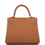 A view of the signature palladium-tone turn-lock on the front flap of the bag