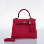 A close-up of the pebbled Togo leather texture on the Hermes Kelly bag