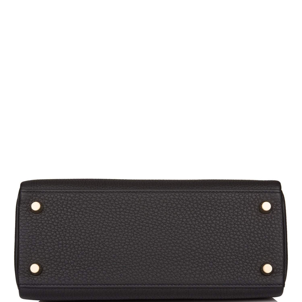 The Hermes Kelly Retourne 25 with its removable shoulder strap attached