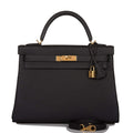 Front view of the Hermes Kelly Retourne 32 in Black Togo leather