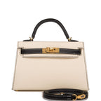 Front view of the Hermes Kelly Sellier 20 in Nata and Black Epsom leather