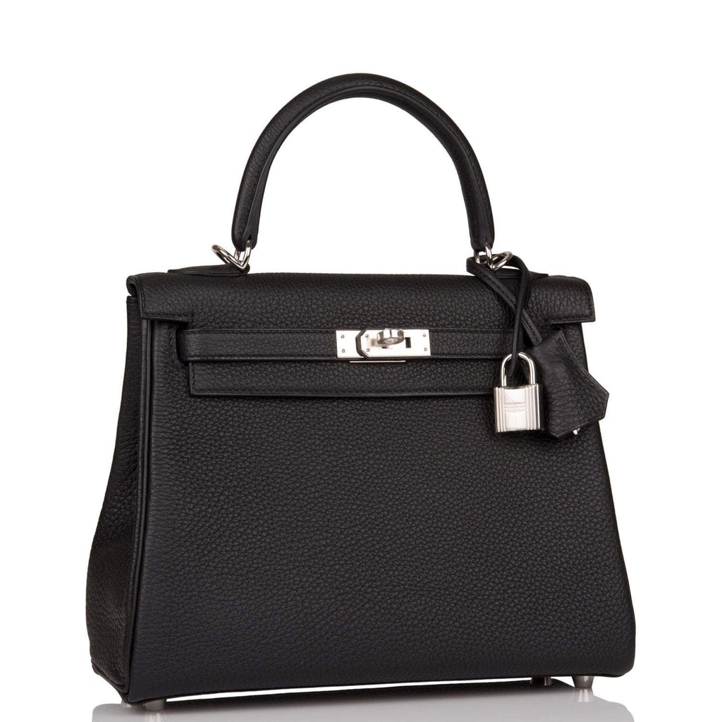 Close-up of the palladium-tone hardware and toggle closure on the Hermes Kelly 20