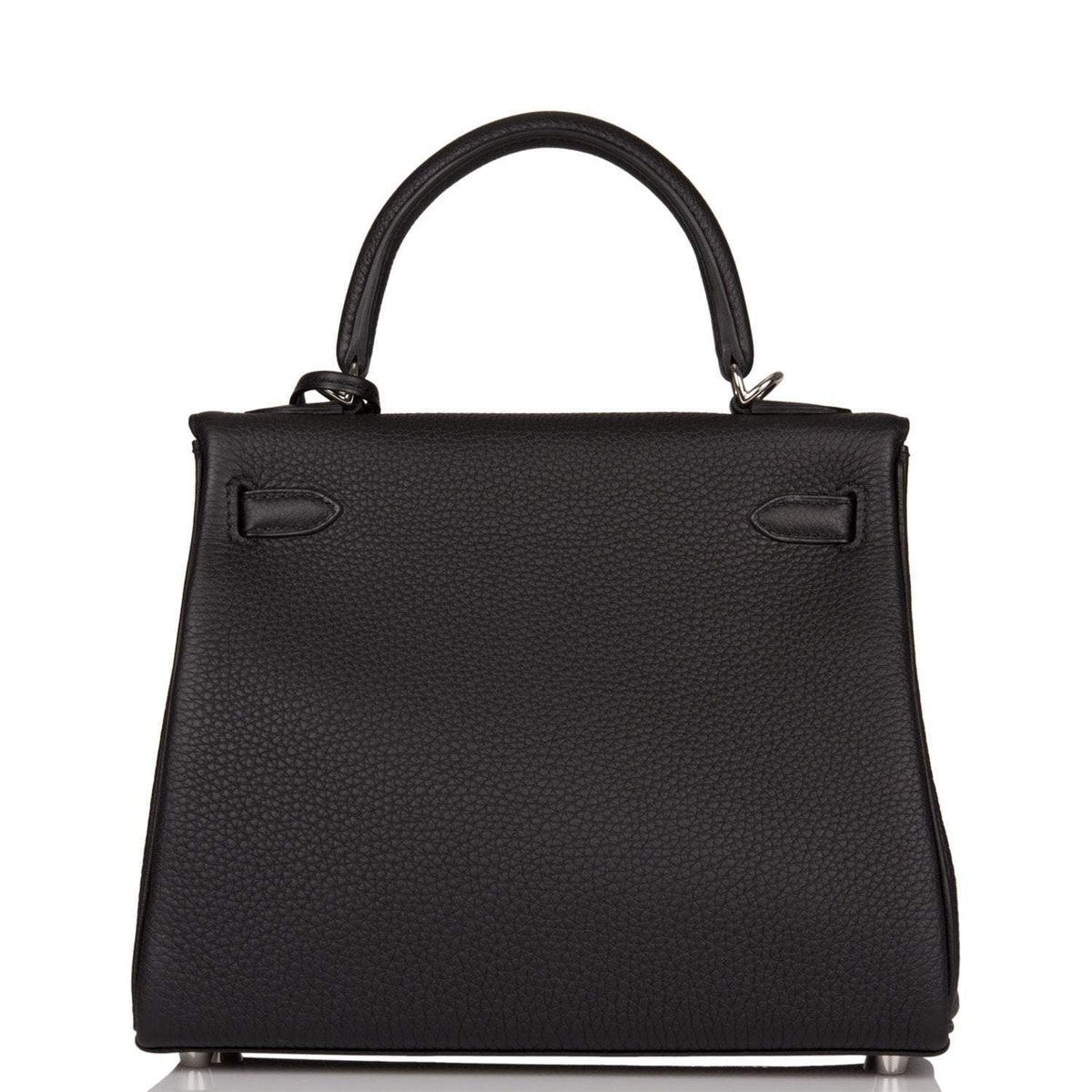 A view of the signature palladium-tone turn-lock on the front flap of the bag