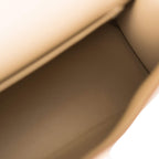 The Hermes Kelly 20 displayed on a surface, highlighting its structured form and colors