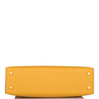 The Hermes Kelly Sellier 20 with its removable shoulder strap attached