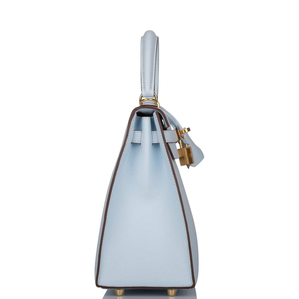 A full view of the Hermes Kelly Sellier 25 in Bleu Brume, showing its elegant proportions