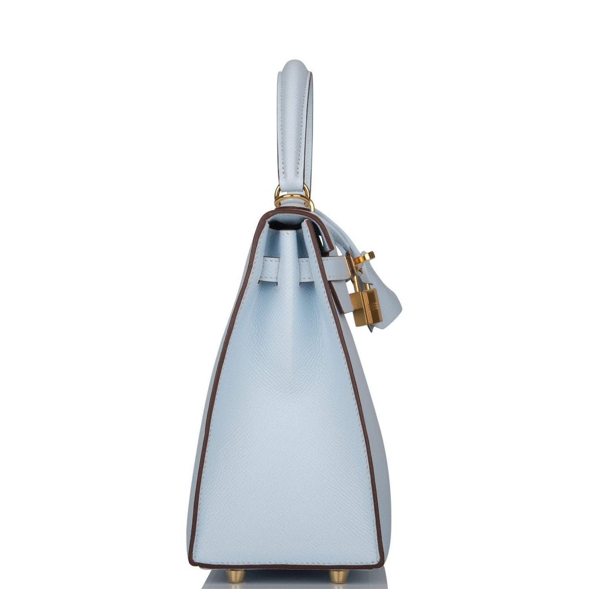 A full view of the Hermes Kelly Sellier 25 in Bleu Brume, showing its elegant proportions