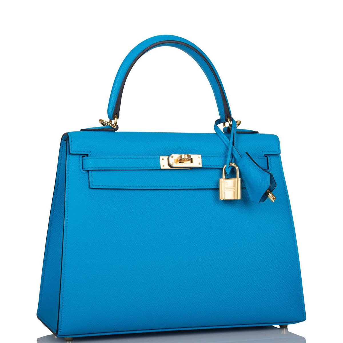 Close-up of the gold-tone hardware and toggle closure on the Hermes Kelly 25
