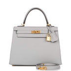 Front view of Hermes Kelly Sellier 25 in Bleu Glacier with gold hardware