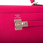 A side view of the clochette and the shoulder strap attachment