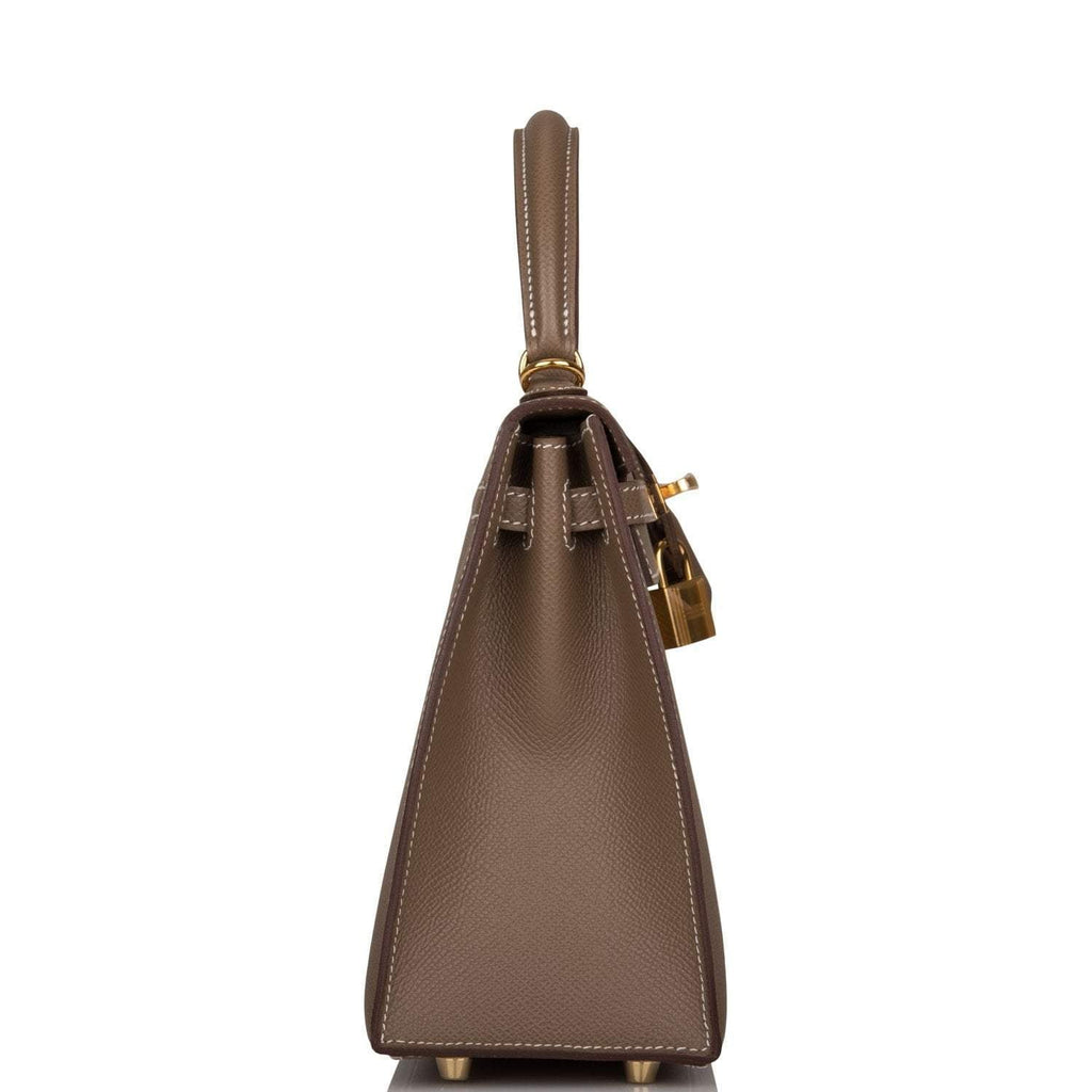 A full view of the Hermes Kelly Sellier 25 in Etoupe, showing its elegant proportions